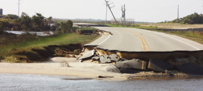 How can North Carolina ensure that its infrastructure is less vulnerable to natural or manmade disasters?
